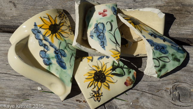 Lament for a Garden Hat and Teacup - broken cup